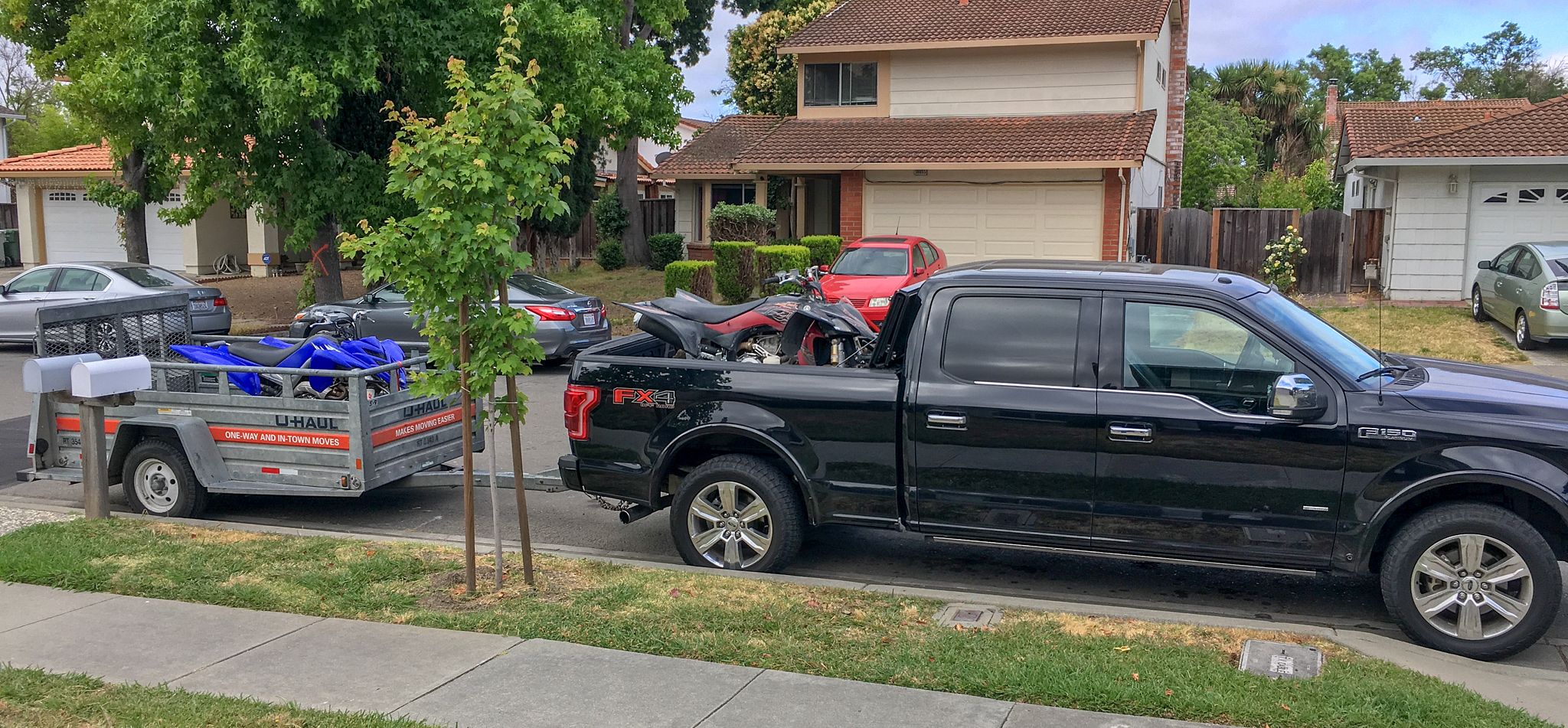 Truck with ATV towing trailer