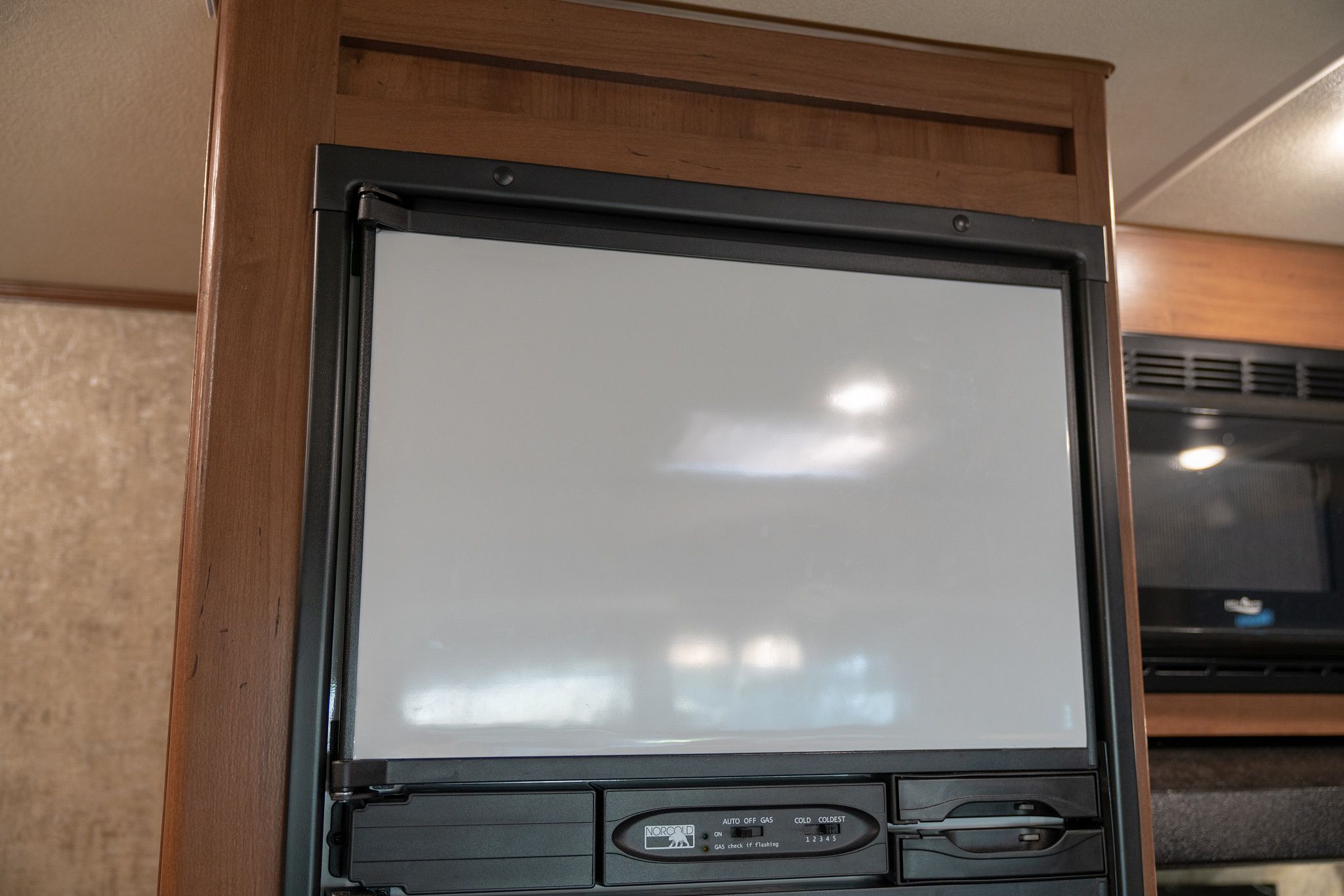 Magnetic dry-erase RV freezer door