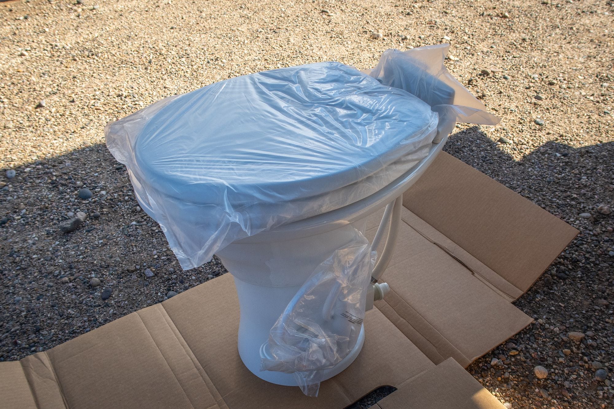 Inspecting RV Toilet