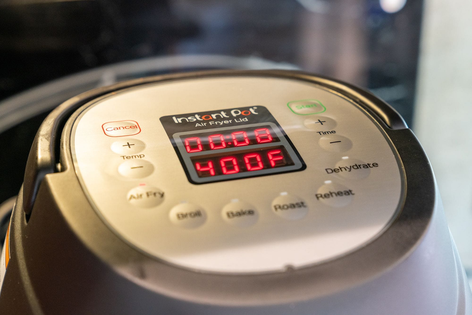 What is the temperature range for air frying using Air Fryer Lid