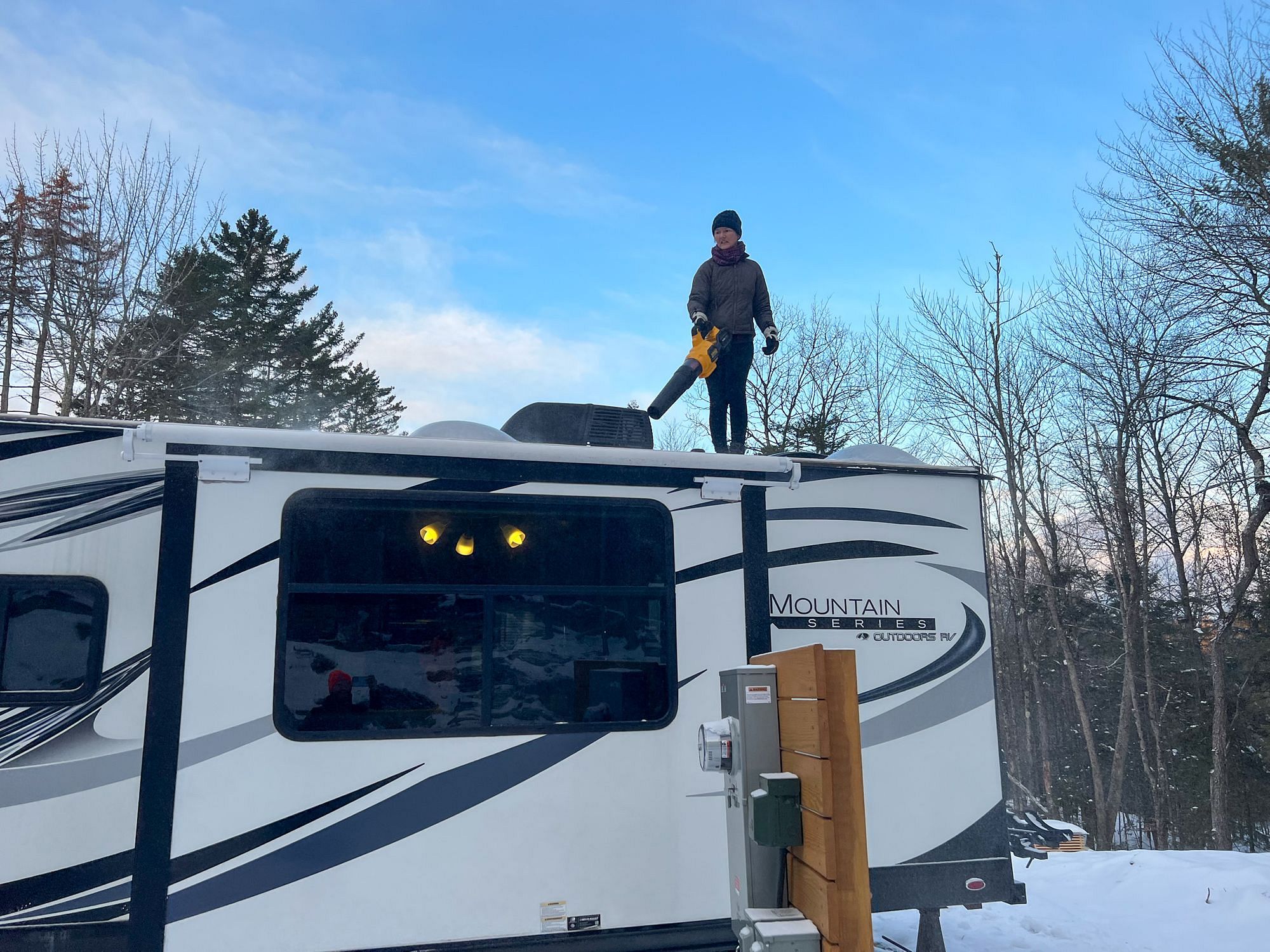 Clearing RV Roof with Leaf Blower